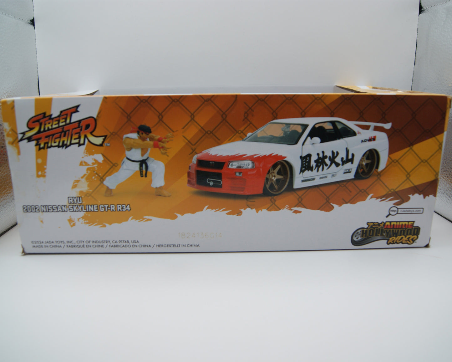 Jada Street Fighter Ryu Nissan Skyline GT-R R34 1:24 mit Figur OVP