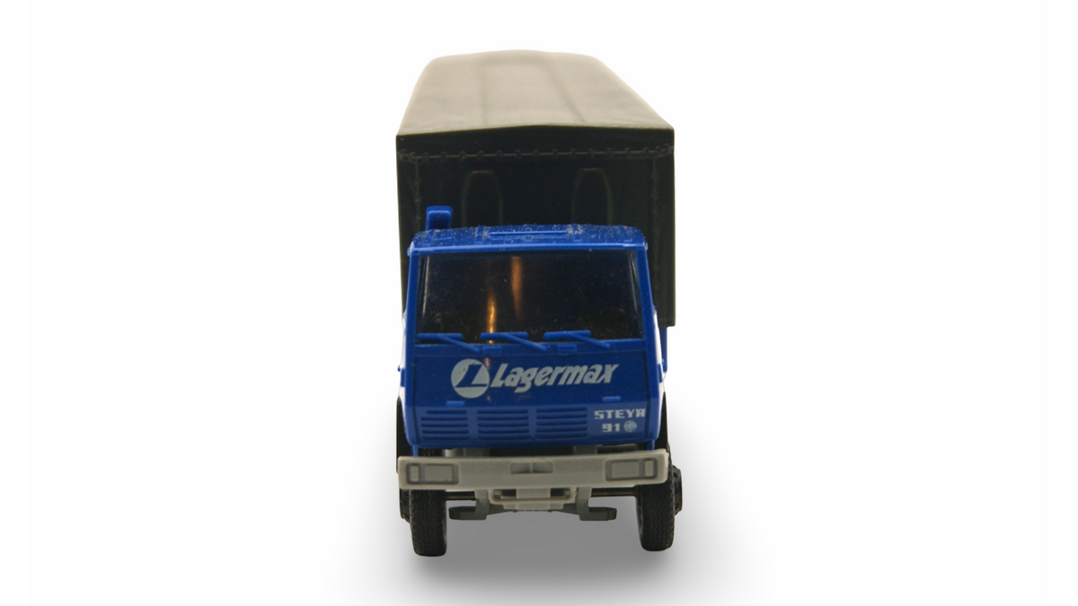 Roco Steyr 91 Lagermax Pritschensattelzug 1:87 H0 – guter Zustand