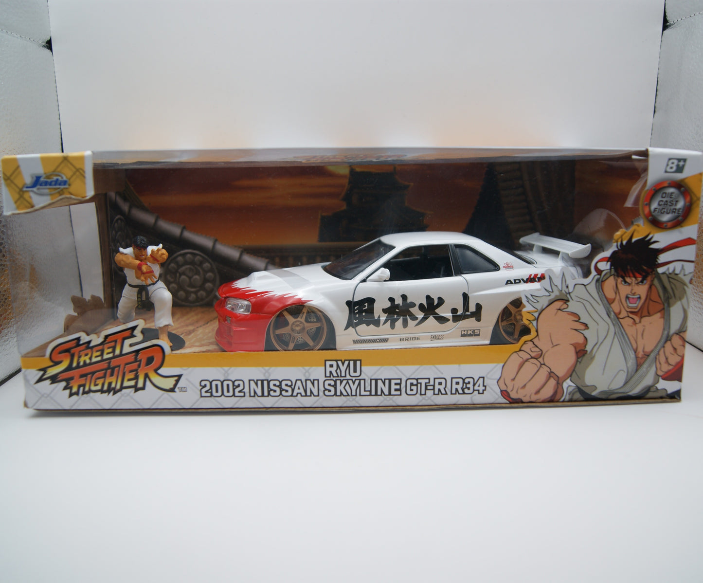 Jada Street Fighter Ryu Nissan Skyline GT-R R34 1:24 mit Figur OVP