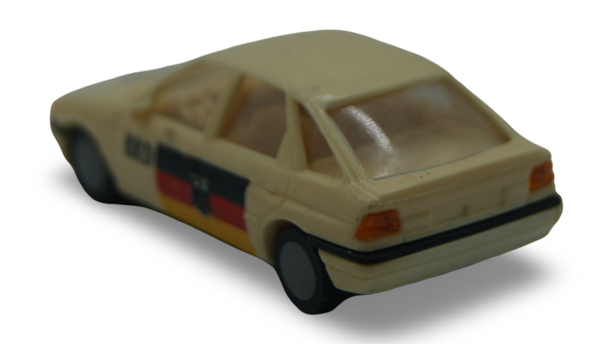 Praliné 5799 Ford Escort Ghia Wiedervereinigung BRD DDR 3.10.1990 H0 1:87