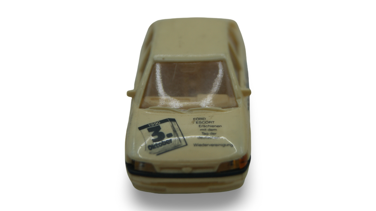 Praliné 5799 Ford Escort Ghia Wiedervereinigung BRD DDR 3.10.1990 H0 1:87