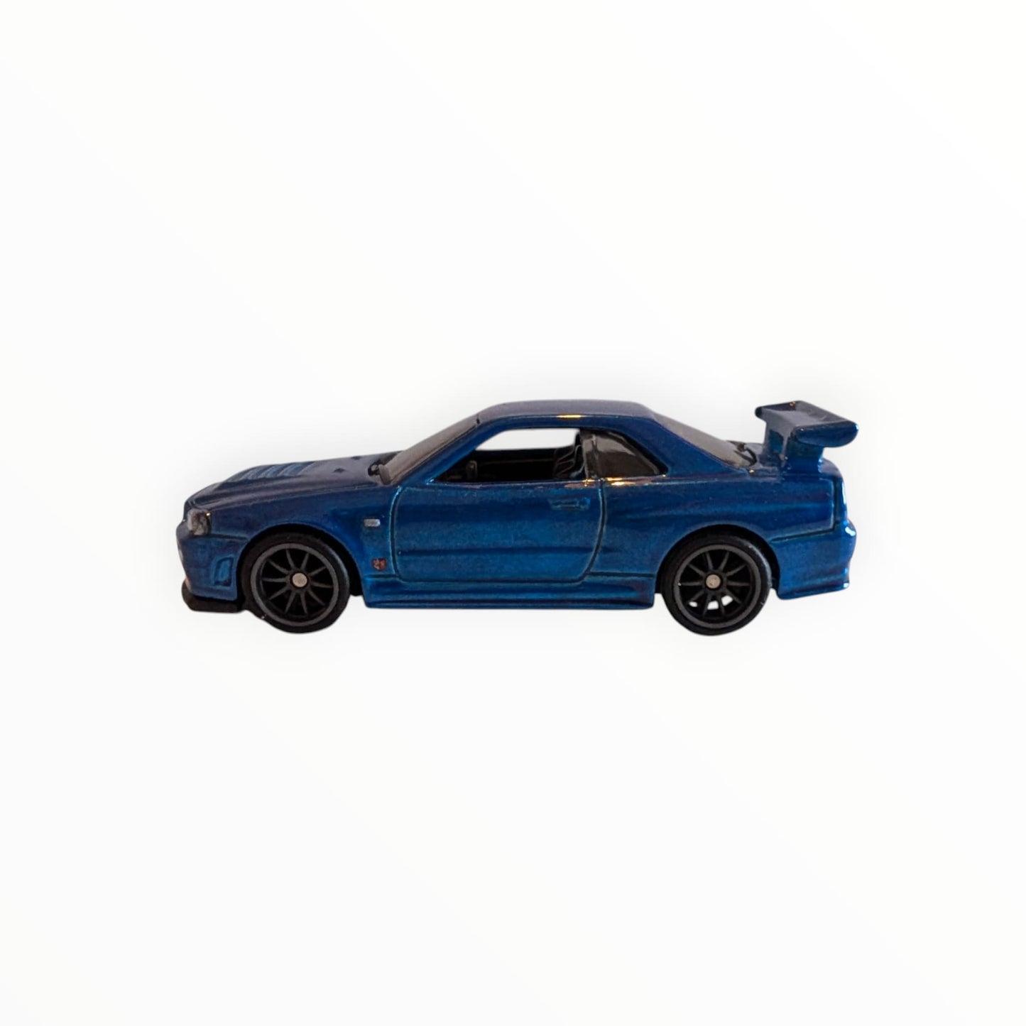 Hot Wheels Premium – Nissan Skyline GT-R R34 / BNR34 – Blau-Metallic – Real Riders – Full Metal Body – lose