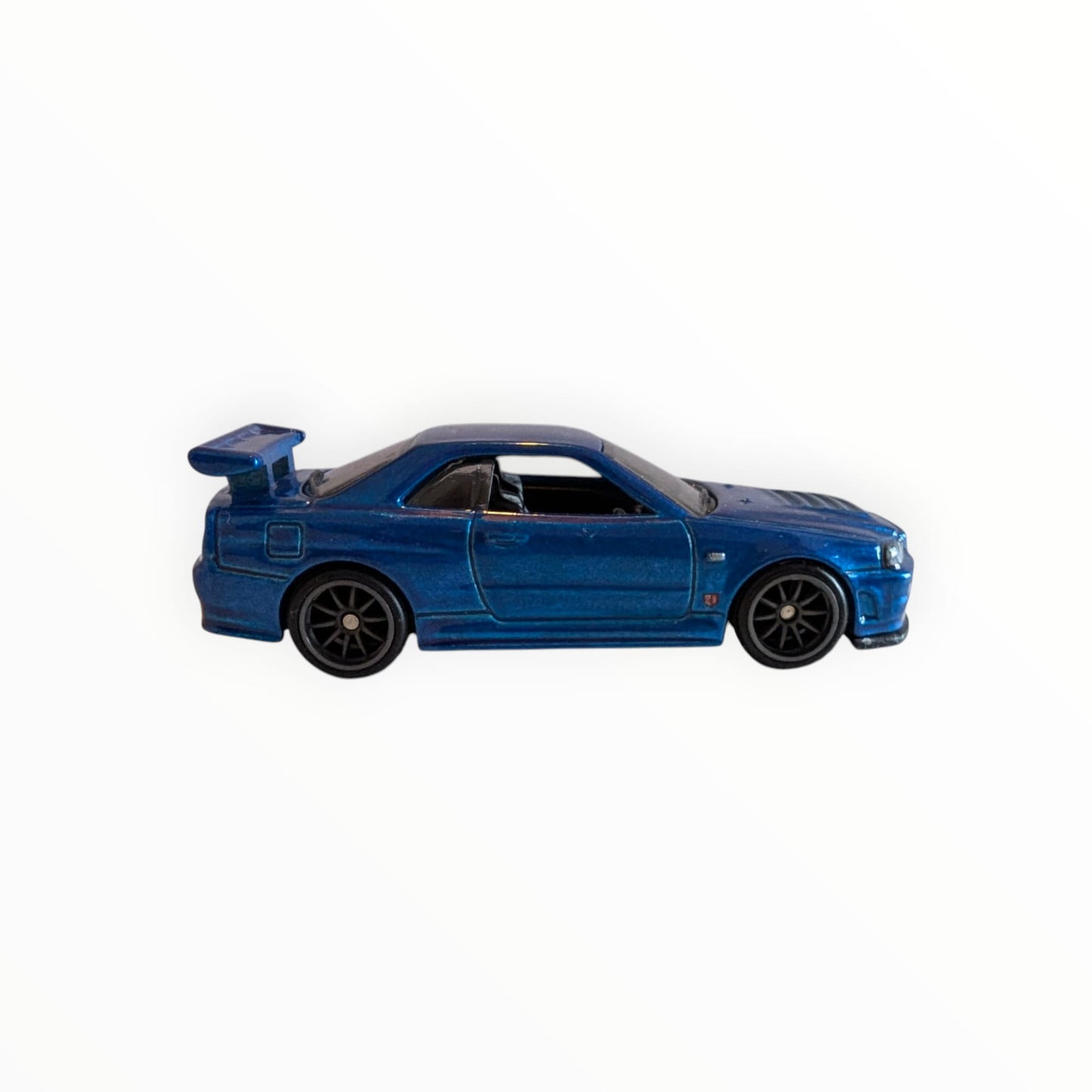 Hot Wheels Premium – Nissan Skyline GT-R R34 / BNR34 – Blau-Metallic – Real Riders – Full Metal Body – lose