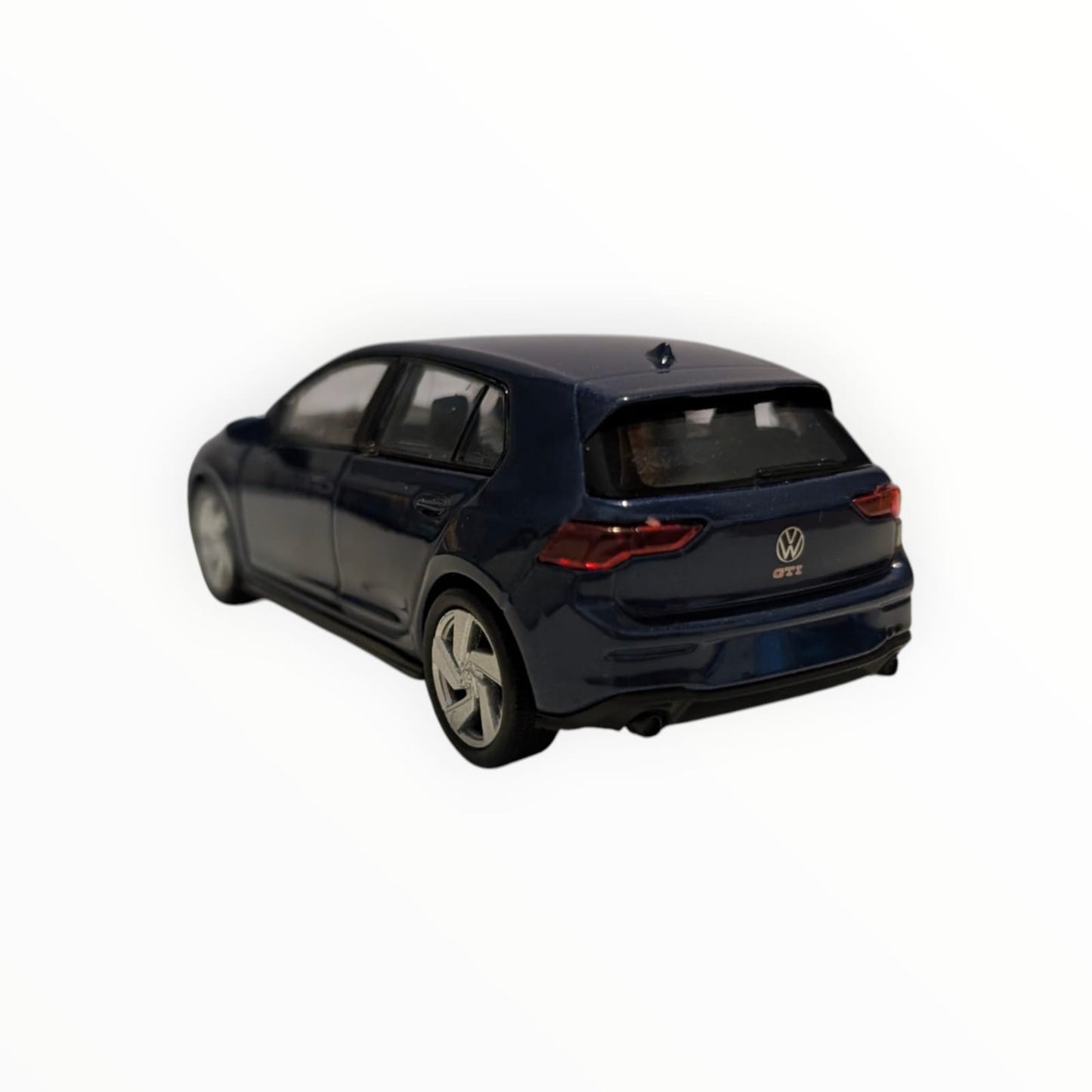 Welly VW Golf GTI – dunkelblau | 1:43 | Rückzugmotor | Neuware