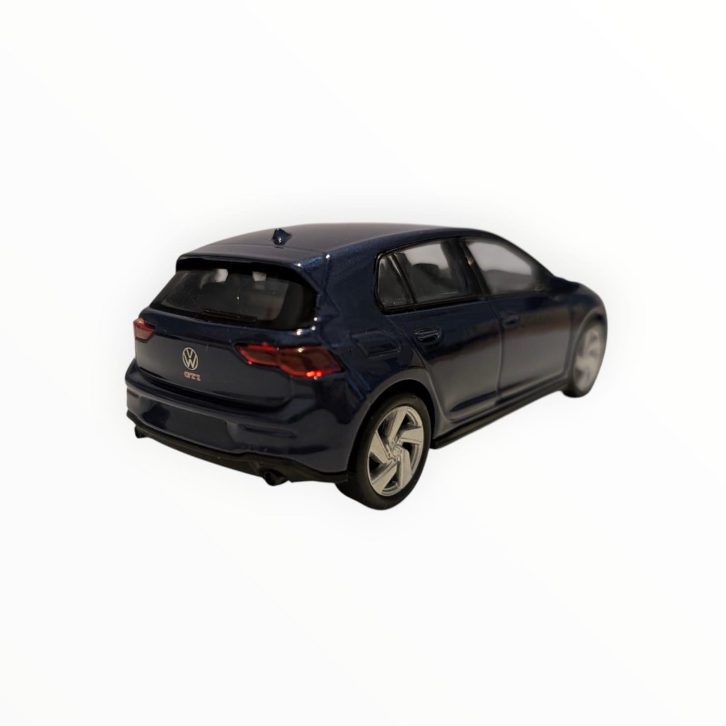 Welly VW Golf GTI – dunkelblau | 1:43 | Rückzugmotor | Neuware